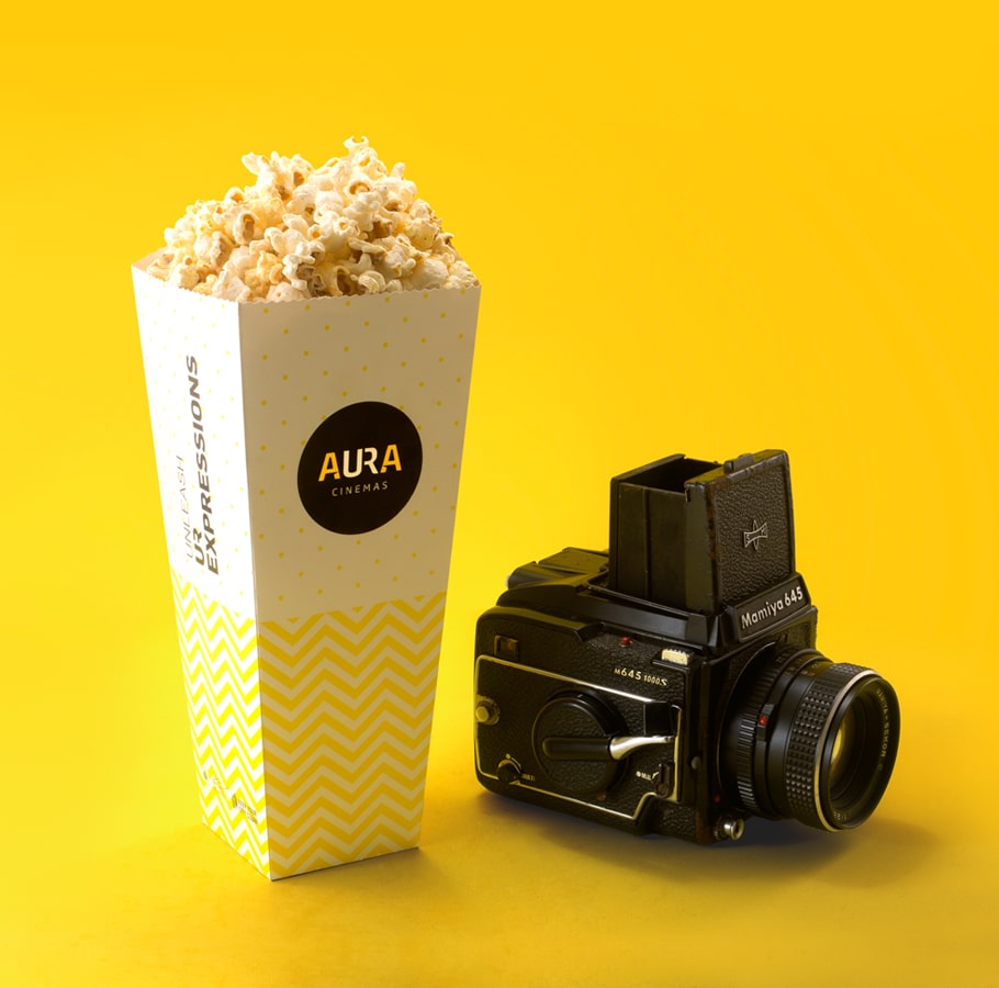 Popcorn packaging design for Aura cinemas